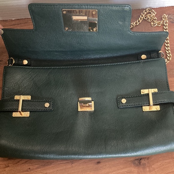 MICHAEL KORS LEADER CLUTCH  BAG